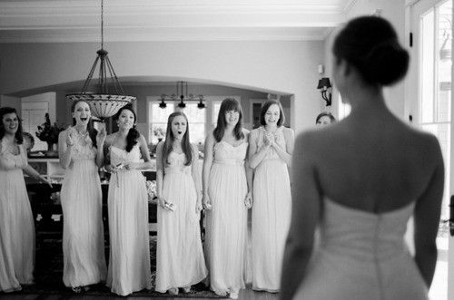 All the bridesmaids' looks when you walk out in your dress … A must photo!