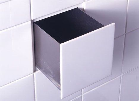 Bathroom tiles that double as secret drawers- great place to stash razors away f