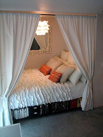 Bed in a closet! So the whole room is open! And it looks so cozy…clever.