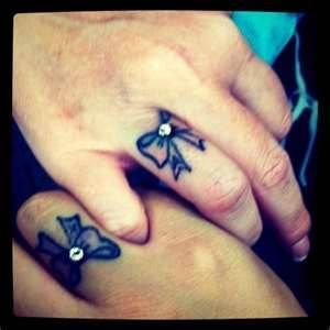 Bow Tattoos Finger