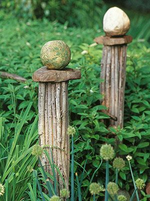 Bundle sticks for decorative, top with flat rock and put round rock on top.   Gr