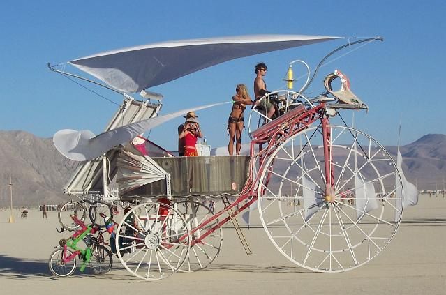Burning Man – Daisy the Solar Powered Tricycle. eatART Founder Rob Cunningham at