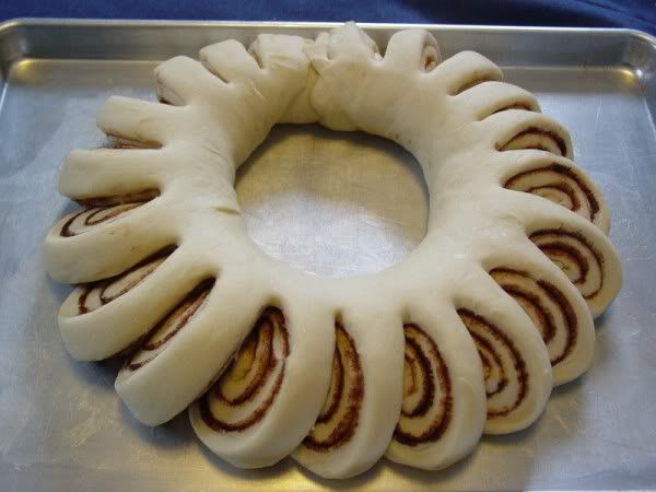 Cinnamon roll wreath. Frosting in the middle for pull apart and dip! Perfect for