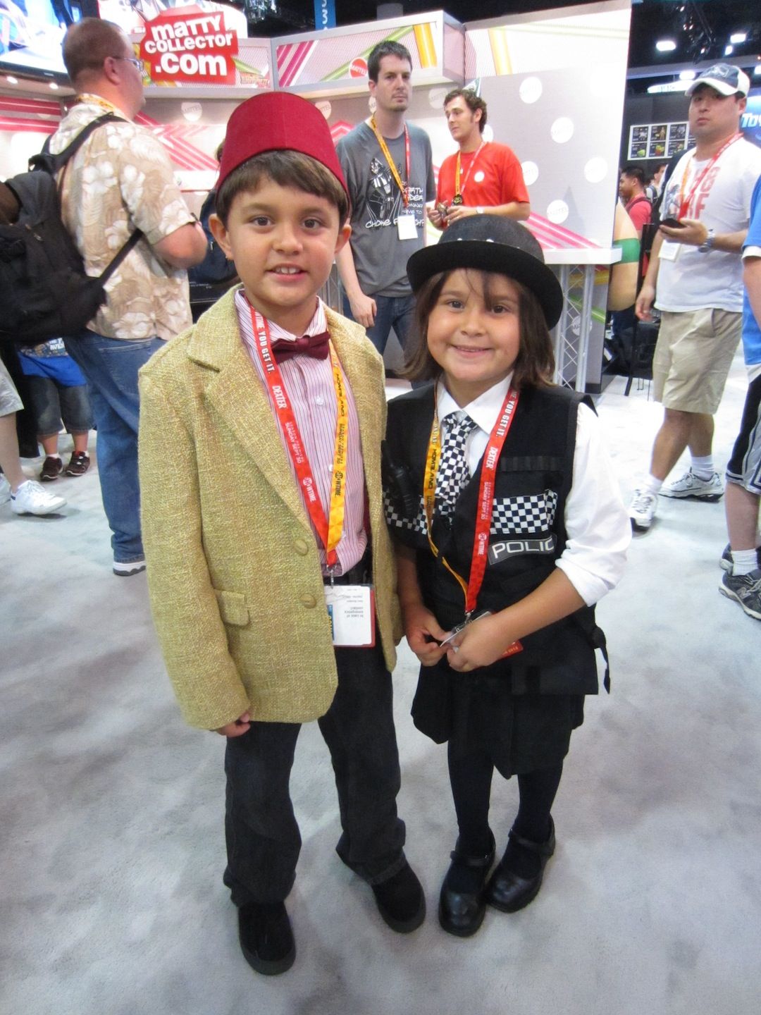 Comic Con 2012 kids cosplay Dr Who with his fez and Amy Pond Kissogram costumes