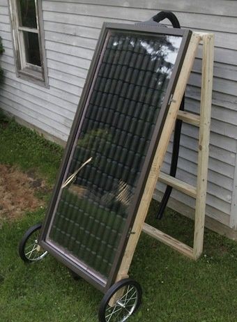 DIY solar heater made from soda cans. Should be enough heat for a green house.