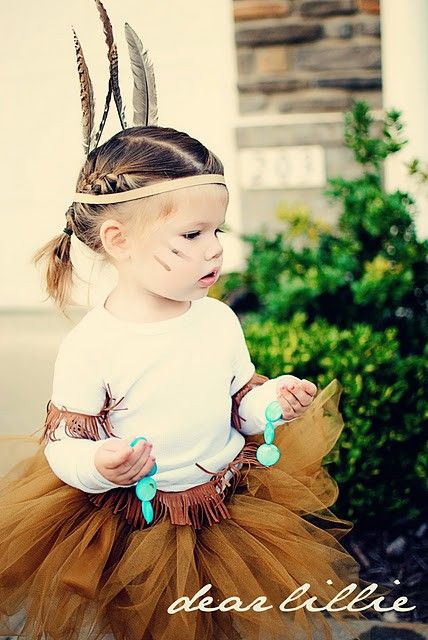DiY Indian costume with tulle skirt and feather in the hair.