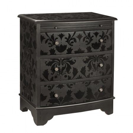 Dresser painted in black matte paint stenciled with black gloss paint. Really ni