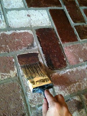 Forget painting brick!  This is a great tutorial for how to stain it and give it
