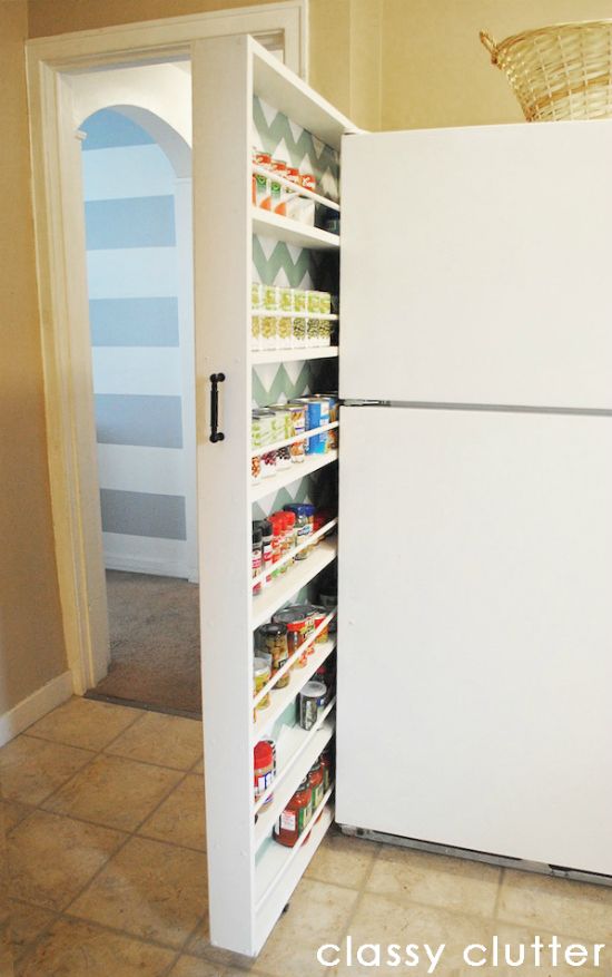 Genius idea for a small kitchen!! Pull out cabinet space on casters!