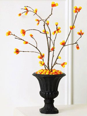 I love this idea just find some clean twigs from outside and hot glue candy corn