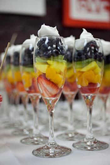 Individual fruit salads. So pretty in champagne glasses!