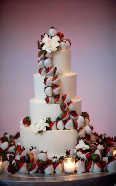 Instead of flowers on a wedding cake, use chocolate covered strawberries!! brill