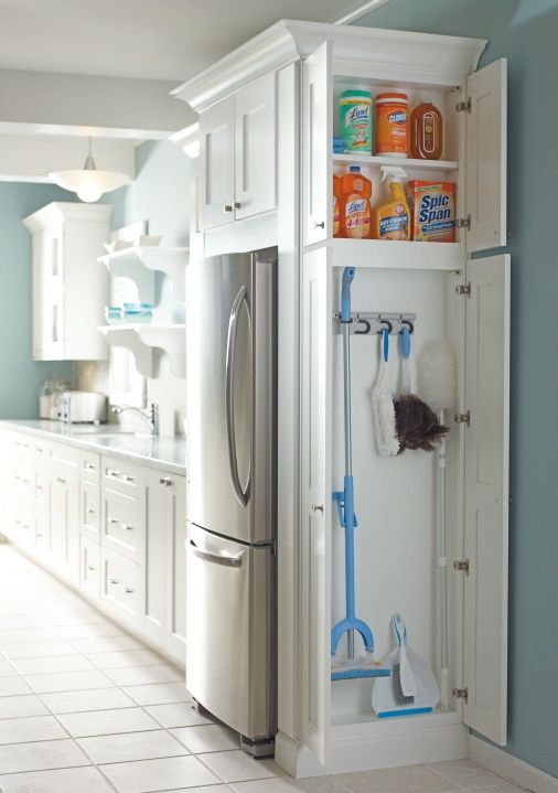 Kitchen cleaning supply storage. I LOVE this.