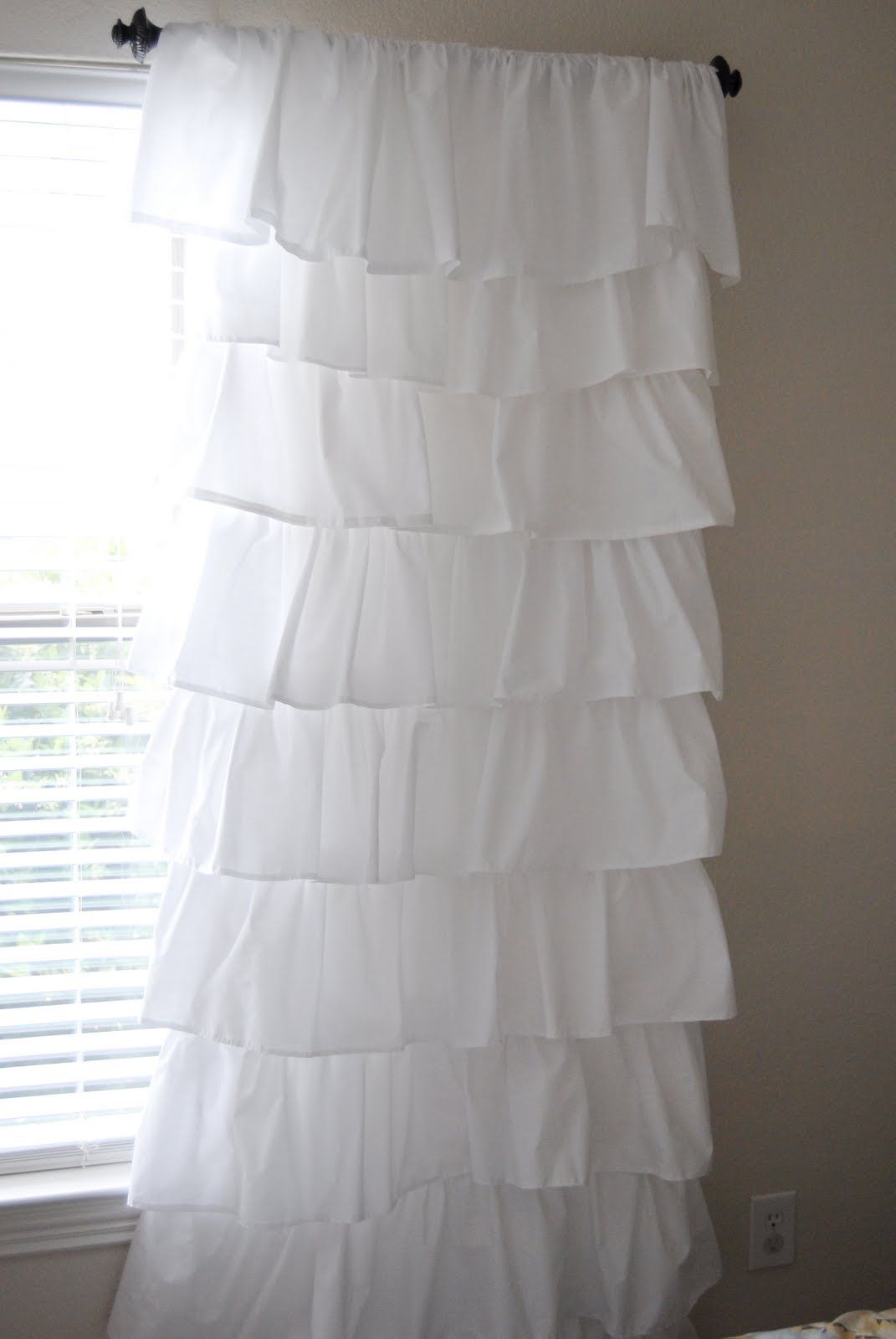 Make your own expensive looking ruffled curtains using $4 flat sheets from Walma