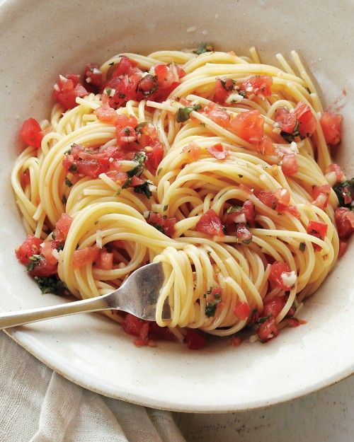 Pasta with Fresh Tomatoes, Basil, Garlic, Olive Oil, and Parmesan Cheese.