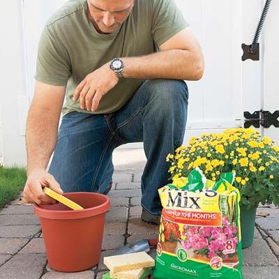Place a sponge in the bottom of a planter before adding soil, to keep water in r