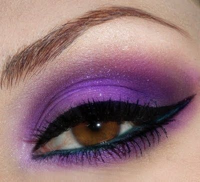 Purple shadow and black liquid liner eye makeup