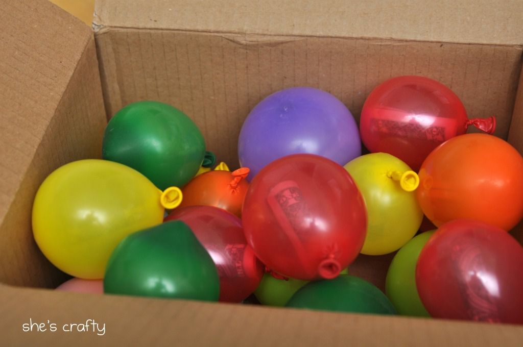 Send a box full of balloons with notes/money inside each one. Won't weigh mu