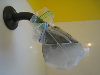 Showerhead Cleaner  -1/3 cup baking soda  -1 cup white vinegar  -1 plastic bag  