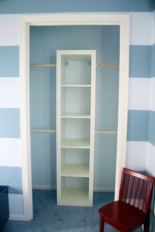 Super Cheap Small Closet Makeover.   Anchor an IKEA Expedit Shelf into the wall.