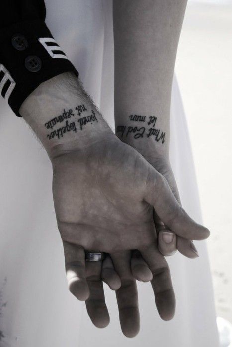 Tattoos read: What God has joined together, let man not separate.