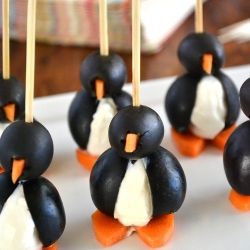 These simple to make Olive and Cream Cheese Penguins will be the hit of your nex