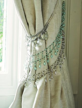 Vintage necklaces as curtain ties… So pretty