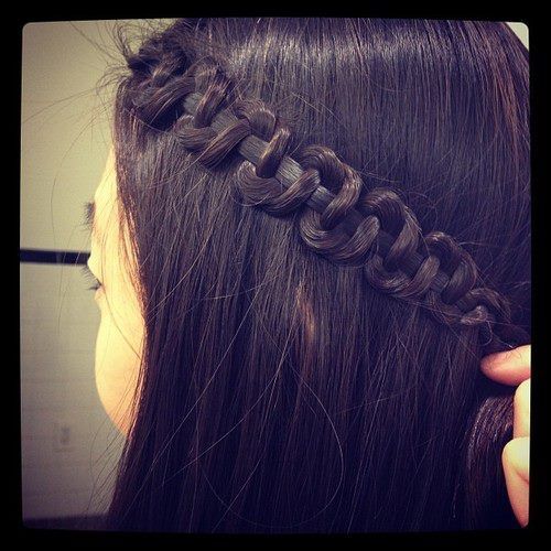 You braid your hair and then hold onto the middle strand and push up the other t