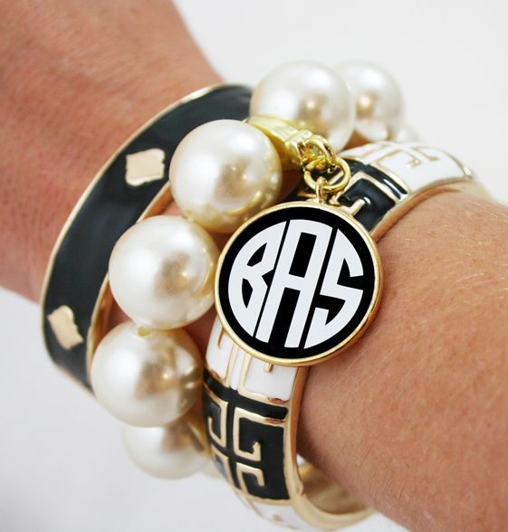 bracelets and a monogrammed charm