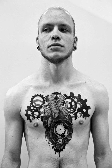 chest/heart mechanical tattoo