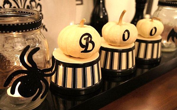 A black and white Halloween display -   40 Spooky Halloween Decorating Ideas for Your Stylish Home