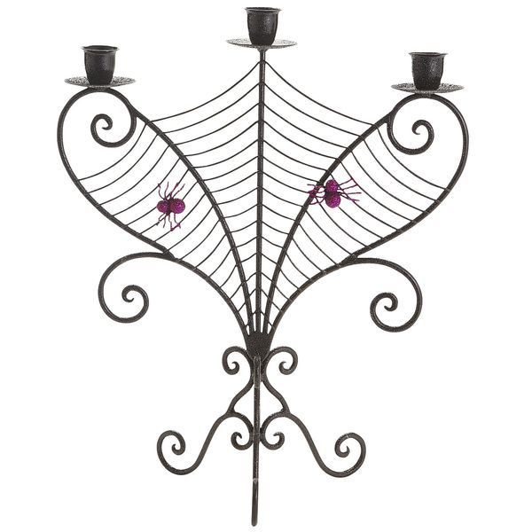 A spider web candelabra -   40 Spooky Halloween Decorating Ideas for Your Stylish Home