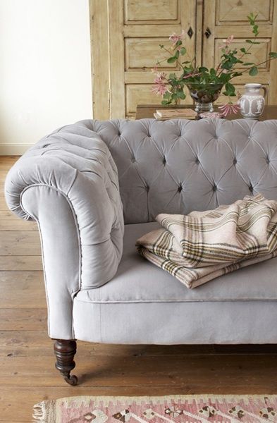 gray tufted couch