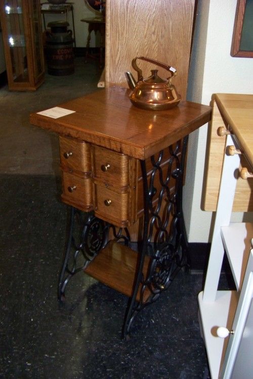 Old sewing machine cabinets with the good parts upcycled.