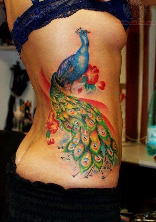Side Rib Color Peacock Tattoo -   Peacock tattoo Ideas