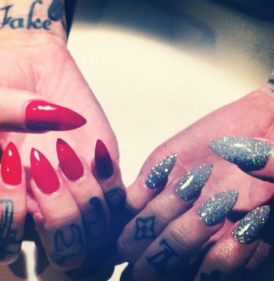 red and holographic pointy nails