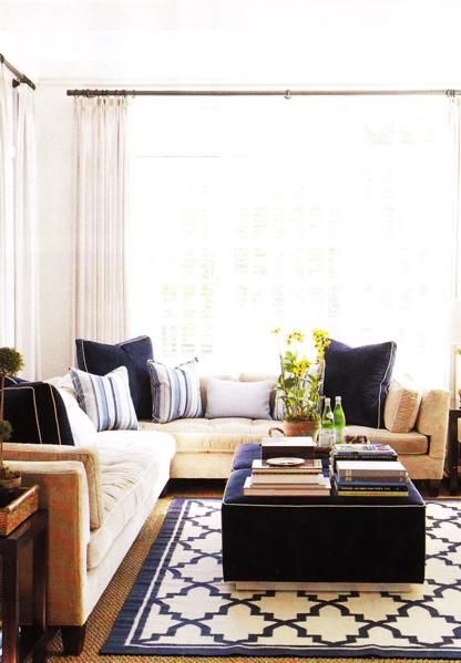 sand beige & navy blue comfy living room design with white paint wall color.