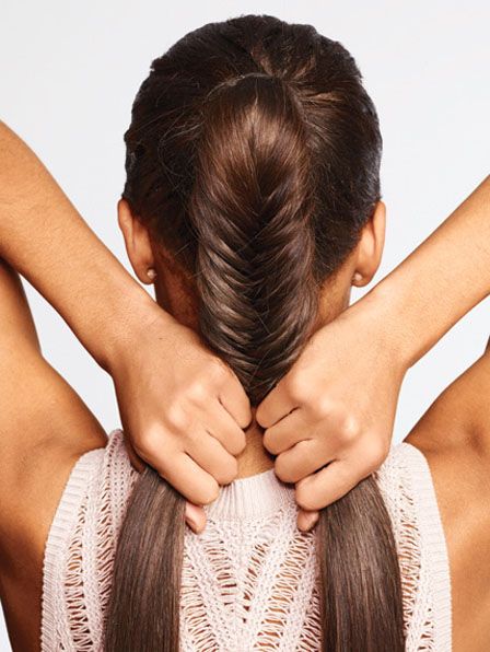 step by step instructions on how to fishtail braid, by Glamour magazine