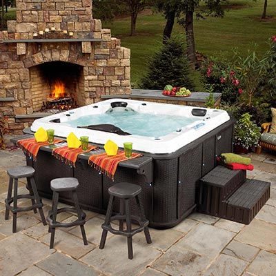 A hot tub with a bar counter. Amazing idea. I will have a hot tub.