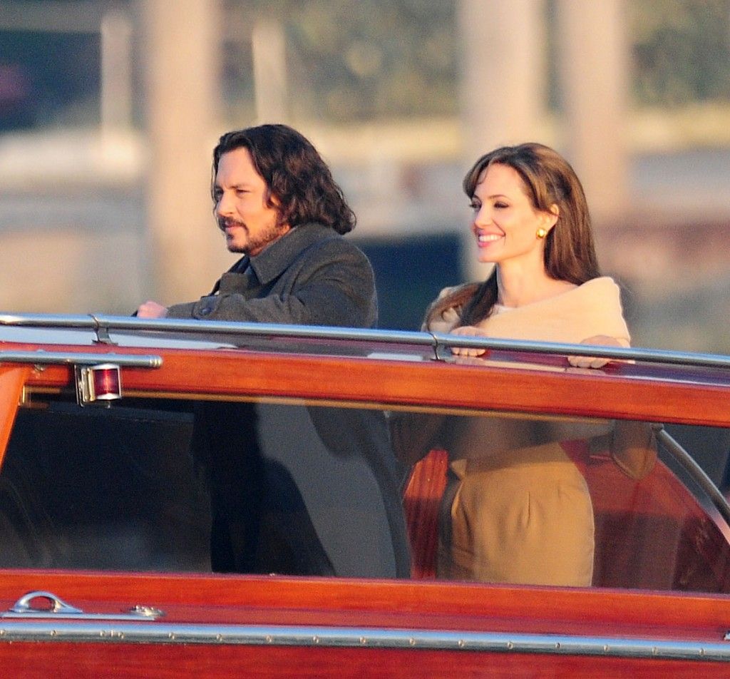 Angelina Jolie and Johnny Depp film on the back of a boat for their movie The To