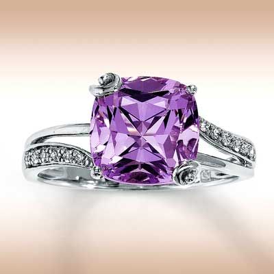 Beautiful engagement ring! Purple is my favorite color :)