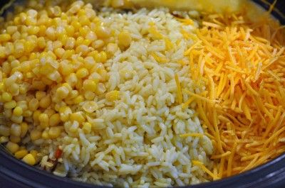 Crock pot Cheesy Chicken and Rice–this is SO easy to make. The chicken just fal
