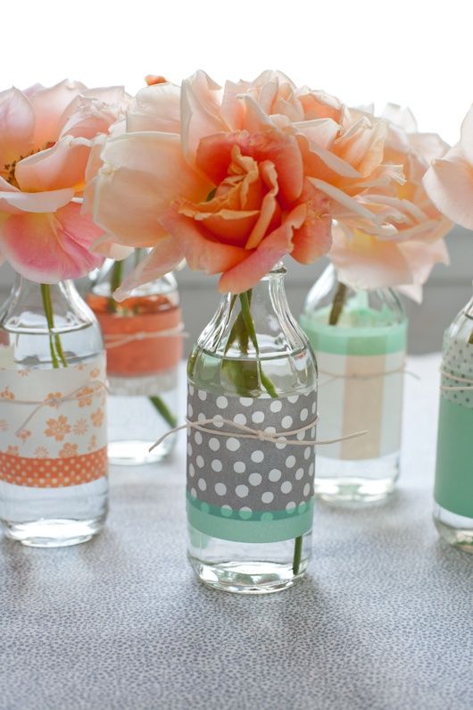 Cute paper wrapped around glass jar vases