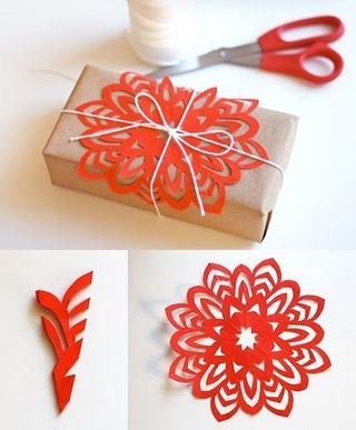 DIY Paper flowers. Cute! A nice way to decorate packages without buying wrapping