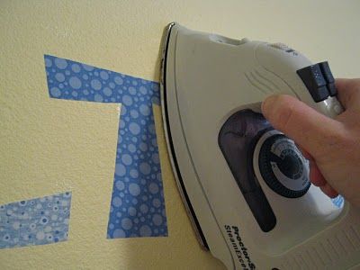 Did you know you could iron fabric onto the wall? Just as easy as vinyl! Peels r