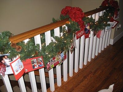Display Christmas Cards in the garland on the stairs