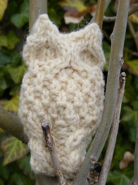 Free knitting pattern for an owl that takes only 10 yards of yarn. This page has