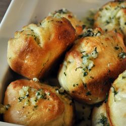 Garlic Rolls made with premade pizza dough, olive oil, garlic and dried parsley.