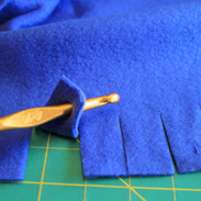 Genius! no-sew fleece blanket edging-so much cuter than the knotted edging!
