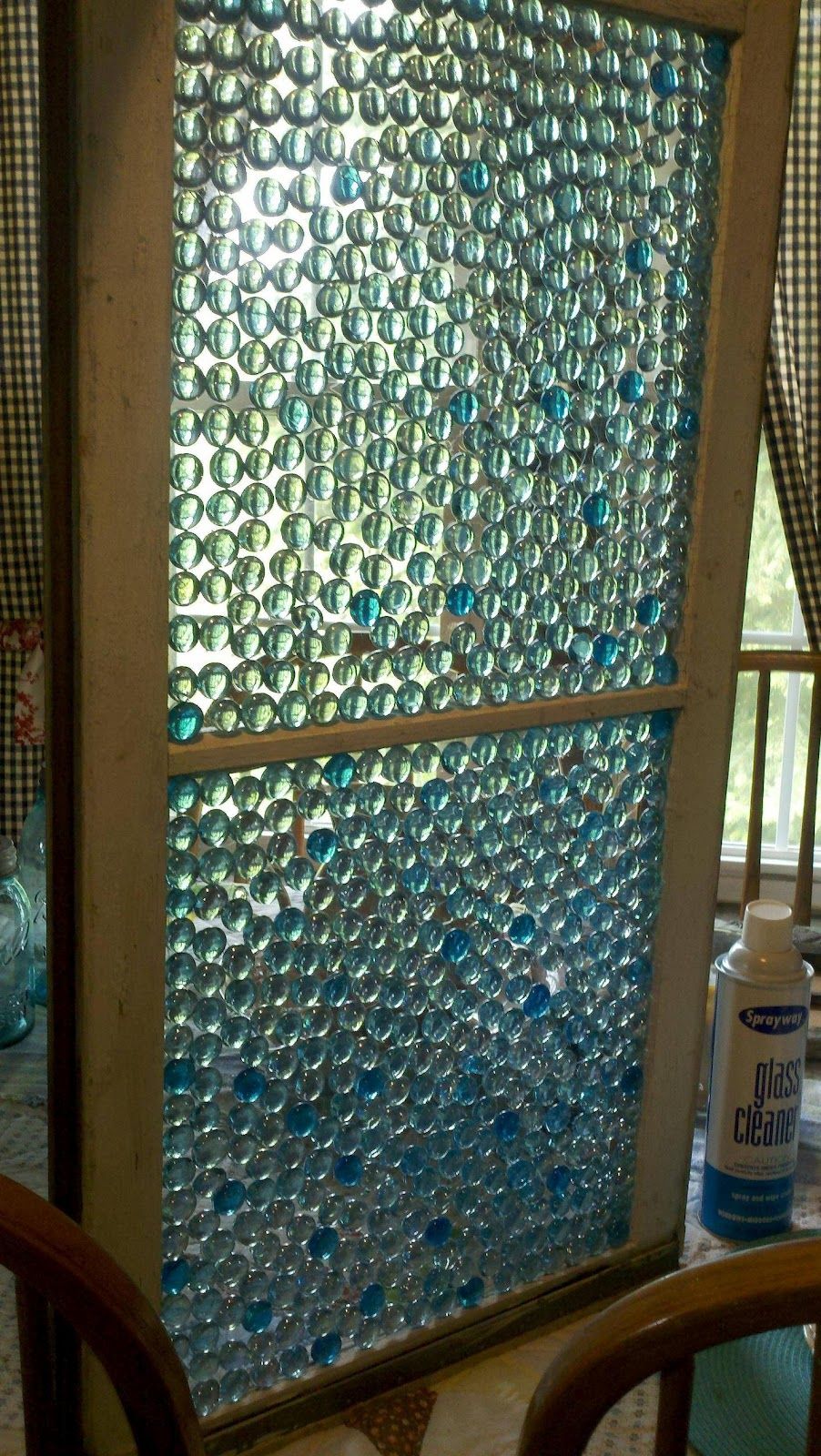 Glass Pebbles from the Dollar Store create this stain glass window look.